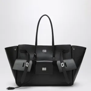 Balenciaga bär all stor väska i svart läder i svart läder