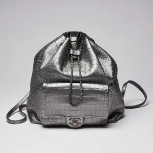 Pre-Loved Chanel™ Silver Croc Embossed Leather Backpack with Metallic Finish
