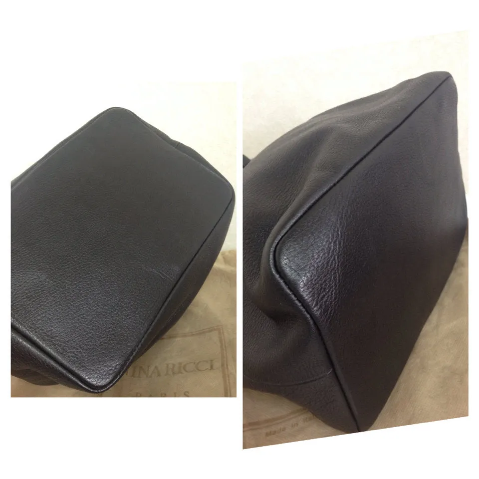 Vintage Nina Ricci genuine black leather classic hobo bucket shoulder bag with embossed logo. Maroquineri collection. Made in Italy